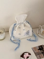 Cream cotton tissue storage bag with blue bow prints and drawstring closure - Blue