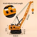 Crawler crane toy cake topper in industrial yellow with retractable boom and manual knob - Yellow Foldable Crane