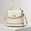 Chic beige lychee leather handbag with wave stitching and gold rotary lock - Off-white