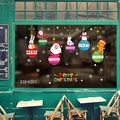 Dettaglio di adesivi natalizi per finestre con Babbo Natale e scritte di auguri Merry - 6283-Sfera Appesa Personaggi Natalizi