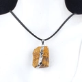 Natural tiger eye stone pendant necklace with silver edging on a white model - Tiger Eye (Silver)
