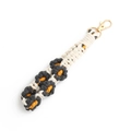 Handmade woven flower wrist strap in cream, dark grey, and yellow with gold lobster clasp - Black Grey