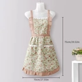Waterproof kitchen apron with green floral print and pink lace trim on white mannequin - Green Princess Apron - Pocket Style