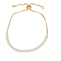Gold adjustable pull-string bracelet with round white zircons on a clean white background - White