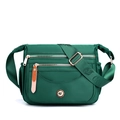 Forest green multi-pocket nylon crossbody bag with wide logo strap and gold zippers - Forest Green