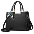 Bolso de mano en cuero negro con grano de lichi, herrajes dorados y un pañuelo de seda decorativo - Negro