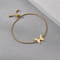 Detail of a golden box chain bracelet featuring a butterfly charm and adjustable bolo clasp - Gold Butterfly