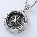 Macro view of silver punk compass pendant with starburst engraving and square link chain - Compass Star Pendant