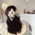 Beige organza bow hair clip with black heart patterns and center rhinestone detail - White Lace Heart Rhinestone Bow Clip