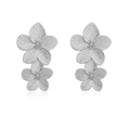 Detailed close-up of shiny silver double floral earrings with sharp petal textures - Double Flower / Silver Double Flower Stud Earrings