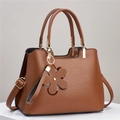 Brown lychee leather tote bag with floral charm and adjustable shoulder strap - Khaki/Earth Yellow