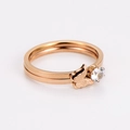 Detail of rose gold double-layer ring featuring a frosted butterfly and zircon stone - US 6 / Rose Gold