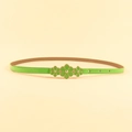 Detail of green skinny belt with three floral ornaments and adjustable golden buckle holes - 100cm / Green