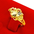 Gold-plated adjustable ring featuring central oval motif with flower and leaf accents - Oval Floral Style (J111502)