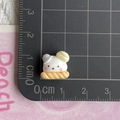 Mini resin bear dessert charm on cutting mat with scale for DIY jewelry making - Bear Long Bread Head