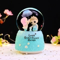 Blue grass base musical crystal ball with cartoon couple, cat and umbrella motif - -035 Blue Base / Large 100mm Snow + Light