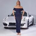 Detail of navy blue sequin off-the-shoulder evening gown with shimmering metallic texture - S / Blue