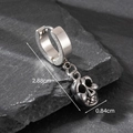 Mens vintage stainless steel skull hoop earring on dark rock background, 2.88cm length - 3D Skull Style (S159)