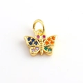 Macro shot of a golden butterfly charm with colorful zircon stones for jewelry making - Blue Orange Pink Green Gemstone Gold Butterfly Style (16)