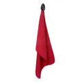 Macro shot of red waffle texture golf towel with black plastic hook attachment - Red
