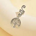 Close-up of a silver Tree of Life pendant earring with an oxidized vintage metal finish - Style 1 (Tree of Life)