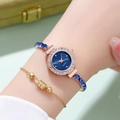 Detail of rose gold quartz watch with blue gemstone bracelet and rhinestone bezel - Blue