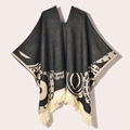 Detail of dark grey western poncho featuring beige tribal patterns and fringe trim - 130x150cm / Pullover Poncho Origin Black