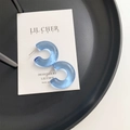 Translucent blue jelly resin C-shaped hoop earrings with minimalist stud design - Blue