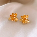 Close-up of golden flower stud earrings on beige silk background with soft lighting - 5# Silver Earring Post - Gold - Lotus