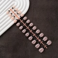 Detailed view of 24pcs nude French false nails with black tips on a professional flat lay - French Black Tip Oval Glossy (DMC-02LY)