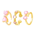 Three gold rings featuring pink heart gemstones and elegant bow knots on white background - Gold/Pink Zirconia