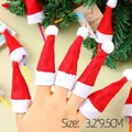 Mini red Christmas hat finger puppet and cutlery decor, size 3.2x9.5cm for holidays - Mini Christmas Hat