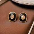 Detailed macro view of retro square enamel stud earrings with pink pearls and gold relief - 65# Real Gold Plated Silver Earring Post Pearl Square Earrings