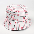 Close-up of reversible bucket hat featuring geometric red and black arrow print pattern - M (56-58cm) / Arrow-White