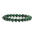 Macro detail of natural green gemstone bead bracelet with unique black mineral spots - Green Spotted Stone