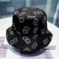 Reversible black bucket hat with dollar sign print and street style hip hop design - Dollar Sign (Black)