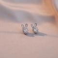 Minimalistische zilveren konijnenketting met sprankelende zirkonia-steentjes - Roterende Konijnenoorbellen (E0178)