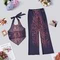 Flat lay of purple tiger print mesh halter top and wide-leg trousers set with props - S / Brown