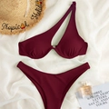 Two-piece burgundy ribbed bikini set featuring a one-shoulder cutout design and high-waisted cut - XS / Fuschia