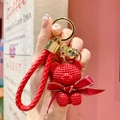 Cute red knitted bear keychain with golden bell and leather strap for bags - Red