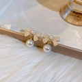 Golden bow earrings with small pavé pearls and a large drop pearl on white plush background - 49# Silver Pin Gold Pearl Bowknot