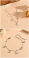 Silver daisy bracelet featuring white enamel flowers and faceted crystal charms - Necklace & Bracelet Set (C715-C714) / Steel