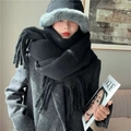 Thick black mohair scarf with tassels and matching faux fur winter hat on a model - Black