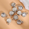 Set di 10 ciondoli rotondi in argento con rilievo luna e stelle per creazione gioielli DIY - Stile 5 (Luna e Stella)