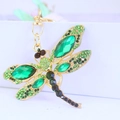 Golden dragonfly keychain with large green faceted crystals and rhinestone accents - Green