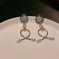 Elegant silver long drop earrings with starburst design and transparent zircons - Geometric Starburst Earrings
