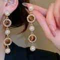 Orecchini vintage a goccia in oro con perle bianche, pietre occhio di gatto e cristalli - 3# Oro-Orecchini a Bottone Tondi con Perla Occhio di Tigre e Nappine
