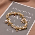 Golden multi-layer pearl bracelet with floral and teardrop gemstone charms on card - Multicolor Pendant Style (GB0193)