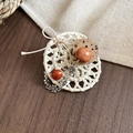 Detailed view of vintage jellyfish brooch with red pearls, wood beads and woven base - White-Brown Woven Handmade