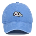 Close-up of cute seal embroidery on washed blue cotton baseball cap with ventilation eyelets - Light Blue